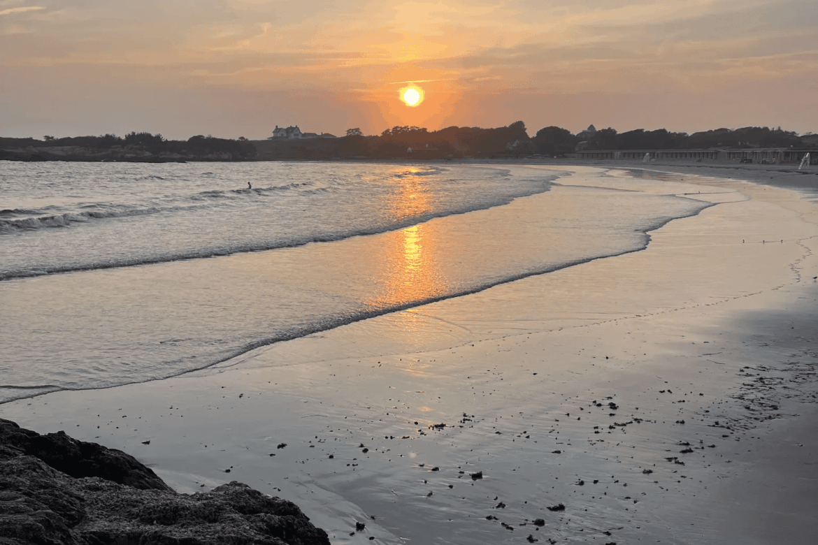 Rejects Beach and Bailey's Beach at sunset from the end of the Cliff Walk in Newport, RI